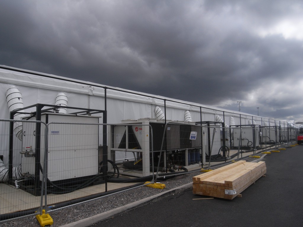 Dehumidification hire- Chiller and hire handler hire. By using the AHU's on-board electric reheat with low temperature chilled water coils, large amounts of water can be removed.