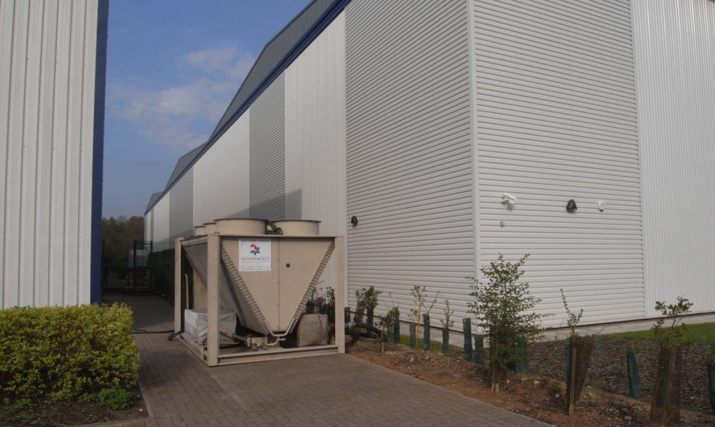 temporary cooling for chocolate storage A 300kw Trane rtab chiller installed outside the building