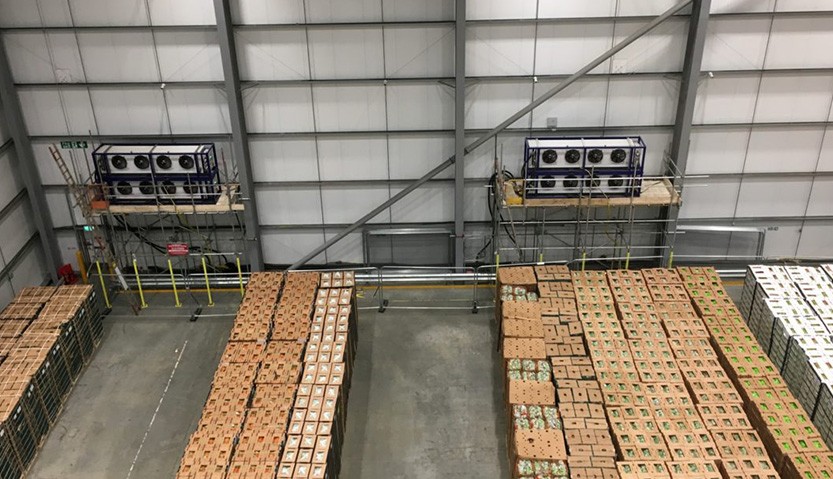 Temporary coolers fitted into a large logistics warehouse for temperature control