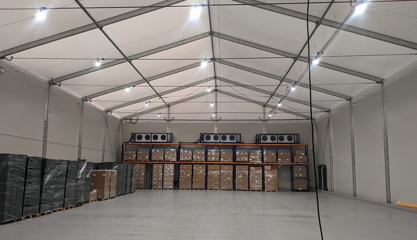 Temporary cold storage hire building for fruit storage.