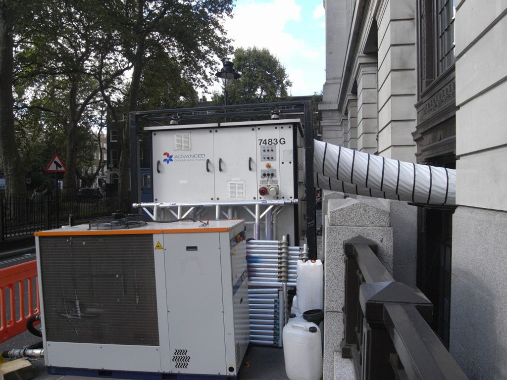 An event HVAC hire air handling unit installed in central london for a fashion event. A water chiller for cooling can be seen in the foreground.