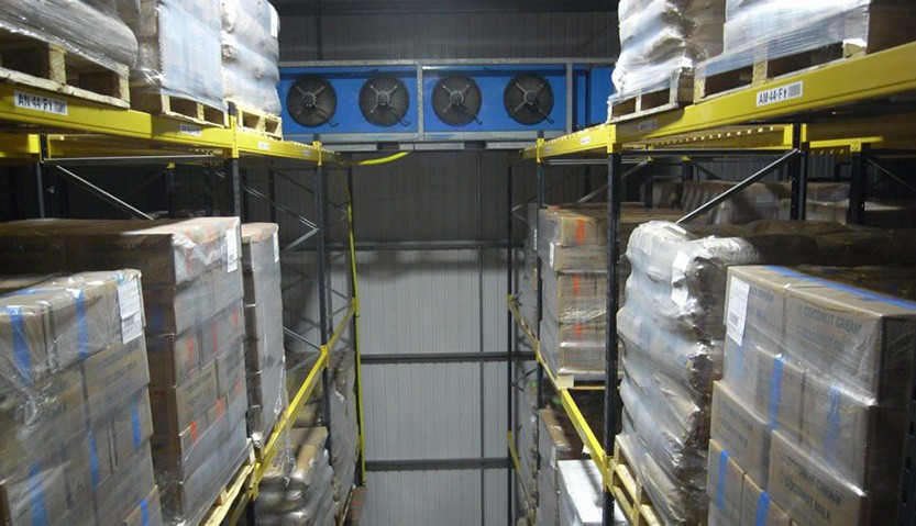 A 100kw temporary warehouse AHU installed into an isle for temporary cooling for chocolate storage