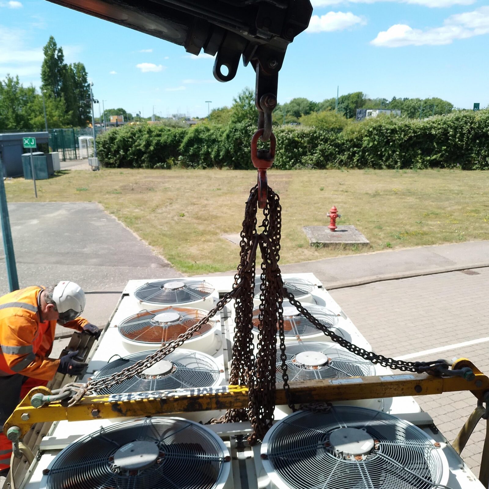 Temporary chiller hire being delivered to a Kent Pharmaceutical site. A spreader bar is used.